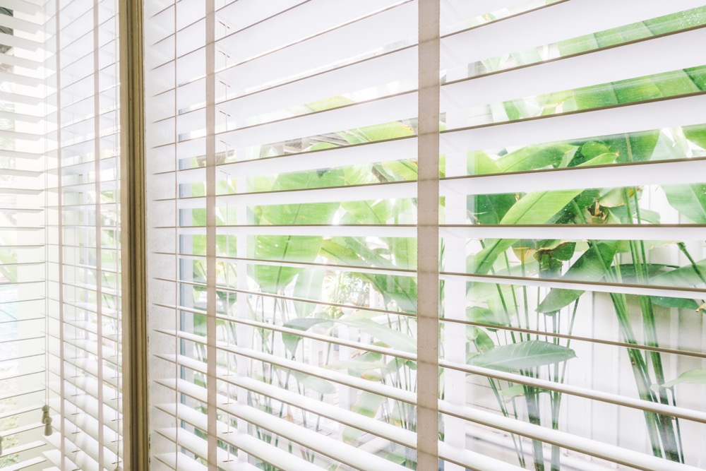 Selective focus point on Blinds window decoration in livingroom interior - Vintage Light Filter
